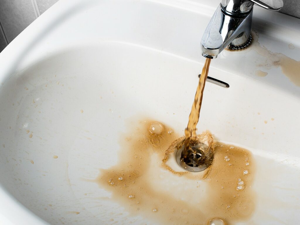 Rusty water coming from tap